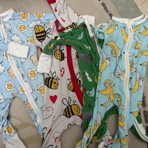 Bundle of 4 Little Sleepies Zippy Pajamas
Size: Newborn & 0-3 Months